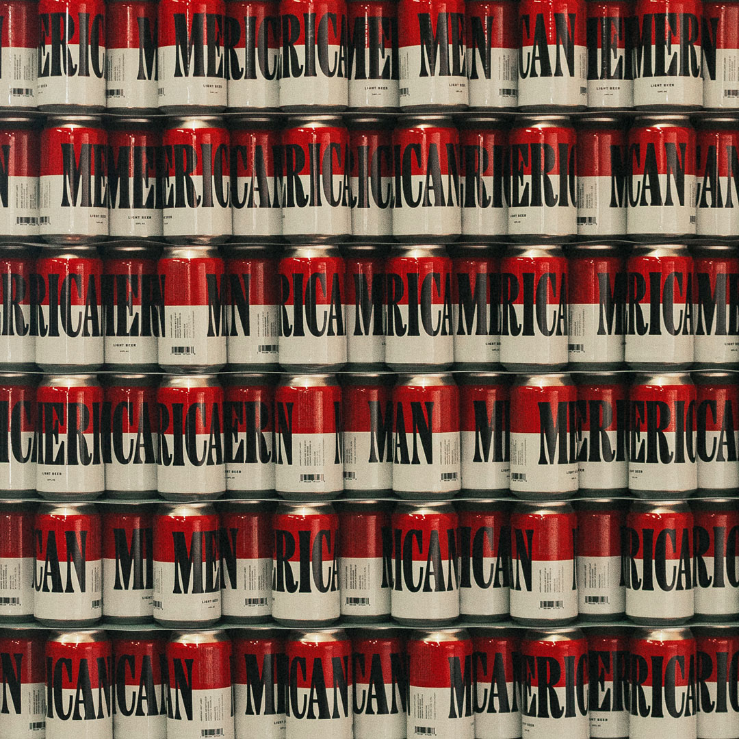 Rows of Merican cans stacked vertically, resembling the horizontal red and white stripes of the US flag.